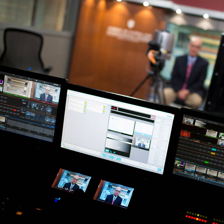 A person sitting in the Global Studio at HLS.