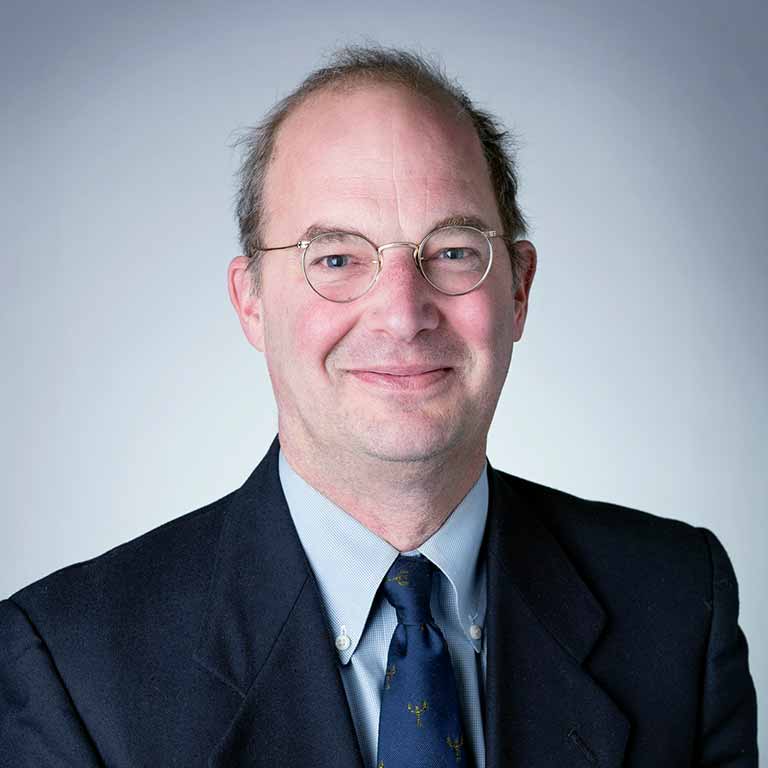 A headshot of Daniel Caner.